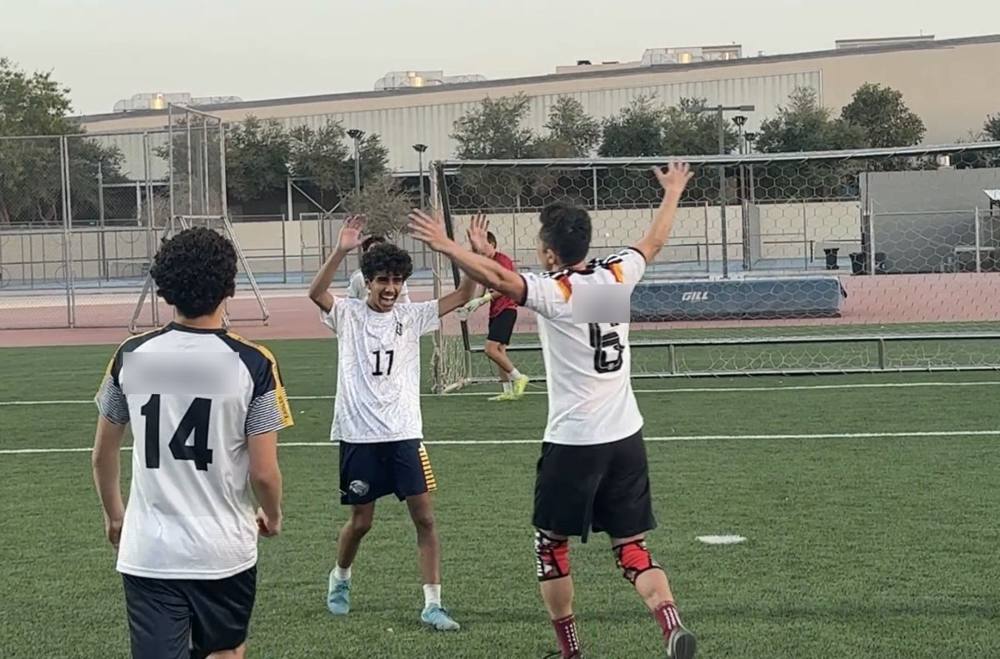 AISR players celebrating a goal