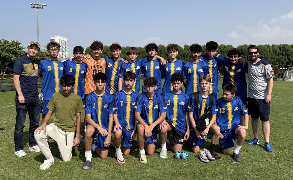 Nick with the AISR U-16 boys team at a tournament in Dubai