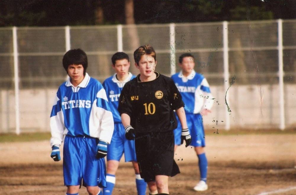 Nick, number 10, playing varsity soccer for ASIJ