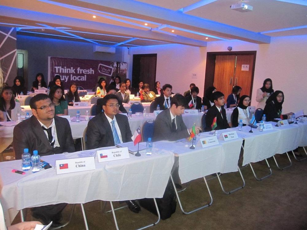 Delegates in committee at a Model UN conference in Bahrain