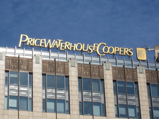 The PricewaterhouseCoopers sign on the office building
